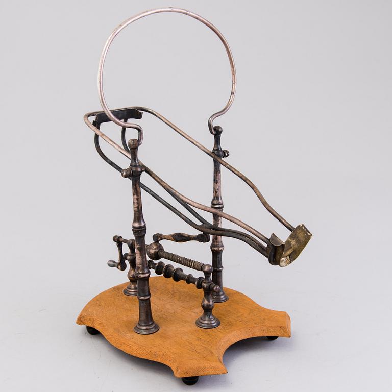 Mechanical Wine Decanting Cradle, around 1900.