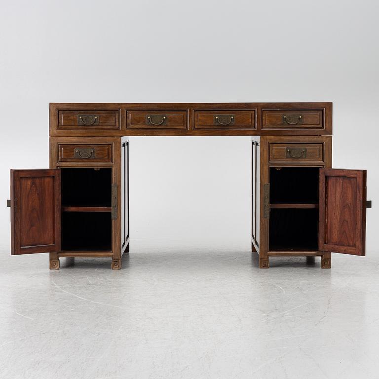 A Chinese hardwood desk, 20th century.