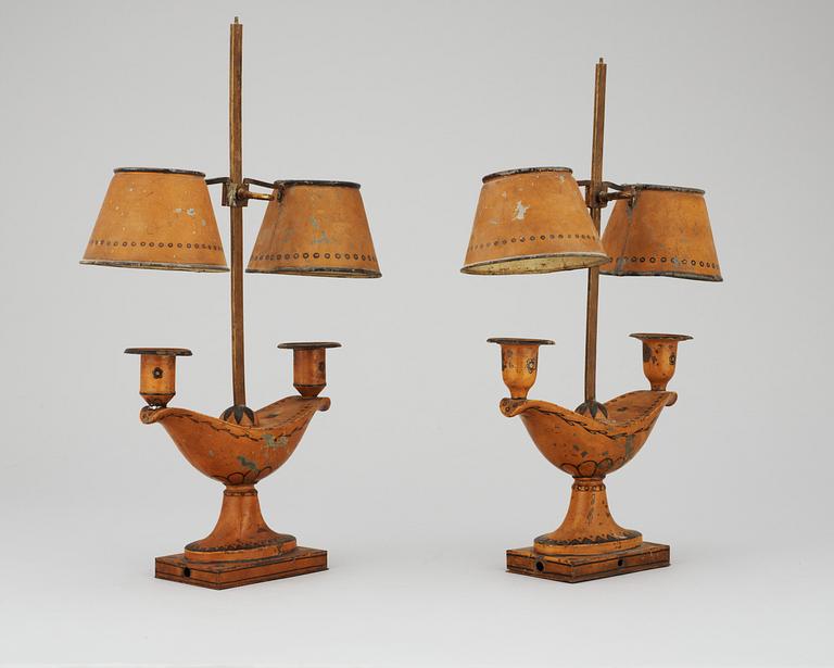 A pair of tole lamps, first half 19th century.