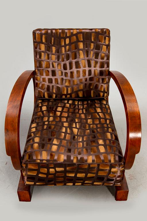 A pair of Art Deco easy chairs.