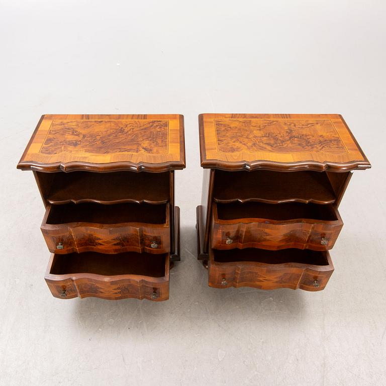 A pair of walnut and mahogany Baroque style b edside tables later part of the 20th century.