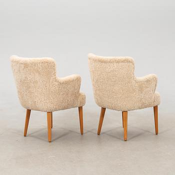 Armchairs, a pair from the 1950s.