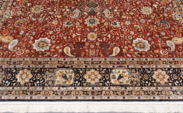 A pictoral Oriental silk carpet, ca 370 x 270 cm.