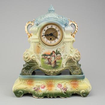 A creamware mantle clock, circa 1900.