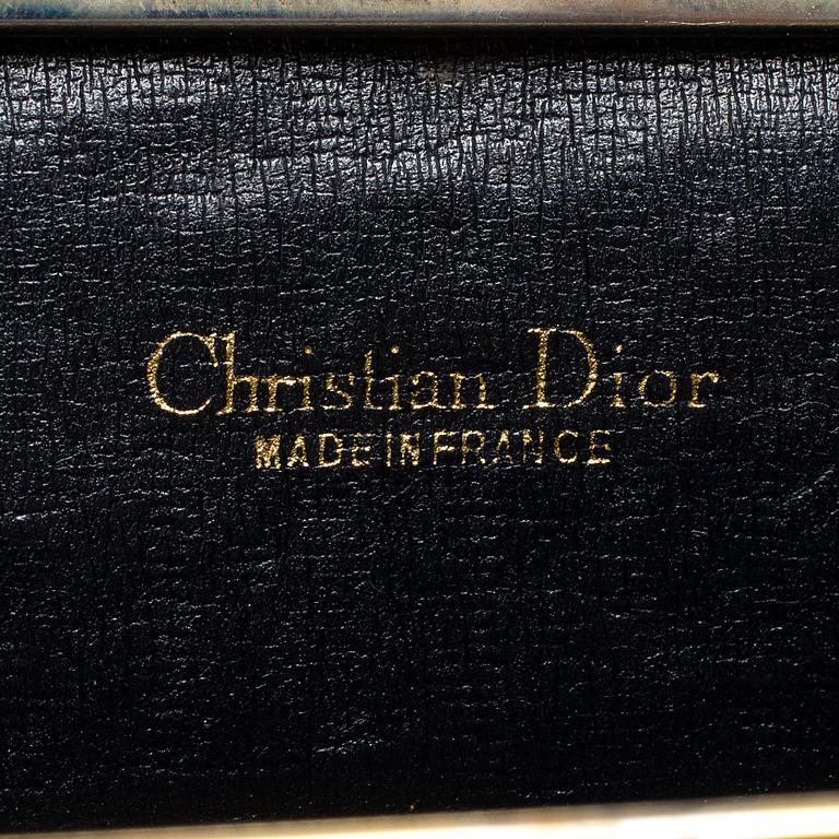 CHRISTIAN DIOR, kuvertväska, plånbok samt weekendbag.