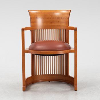Frank Lloyd Wright, a model 606 'Barrel' chair from Cassina.