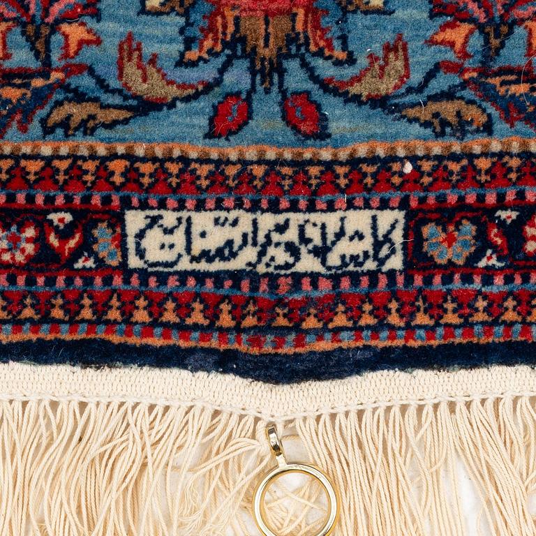 A signed Kashan 'Dabir' carpet, ca 206 x 136 cm.