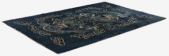 A Chinese 'dragon' rug, circa 1920. (c 190x122 cm).