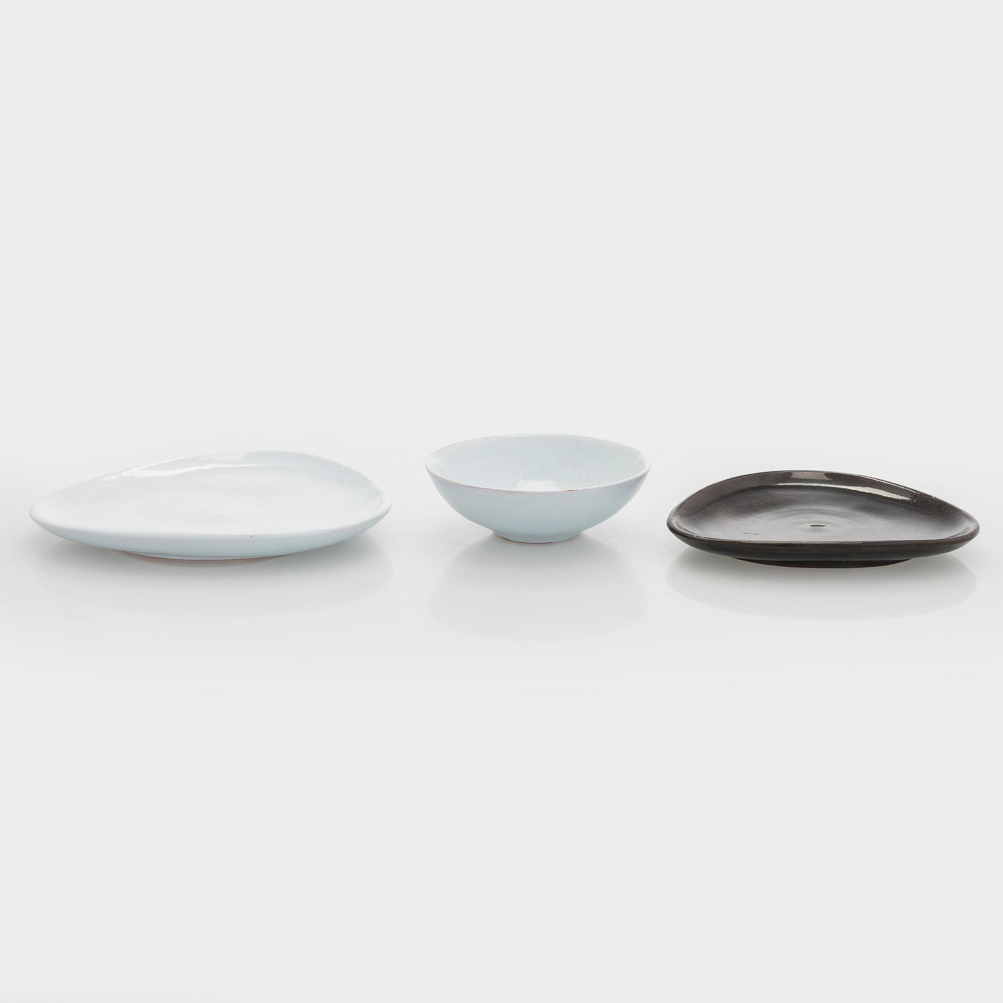 Marita Lybeck, two redclay plates and a dessert bowl, signed ML.