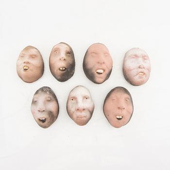 Johan Thunell a set of seven signed ceramic sculptures.