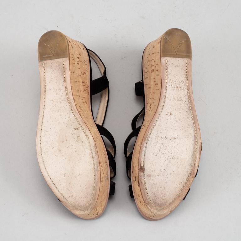 Prada, a pair of black suede wedge sandals, size 39½.