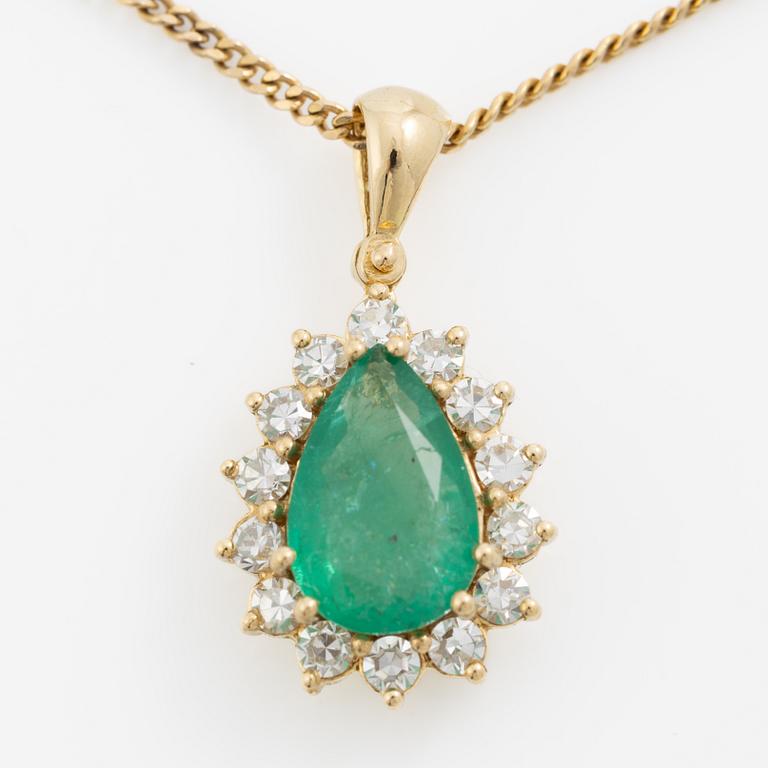 Gold necklace with a drop-shaped emerald and octagon-cut diamonds.