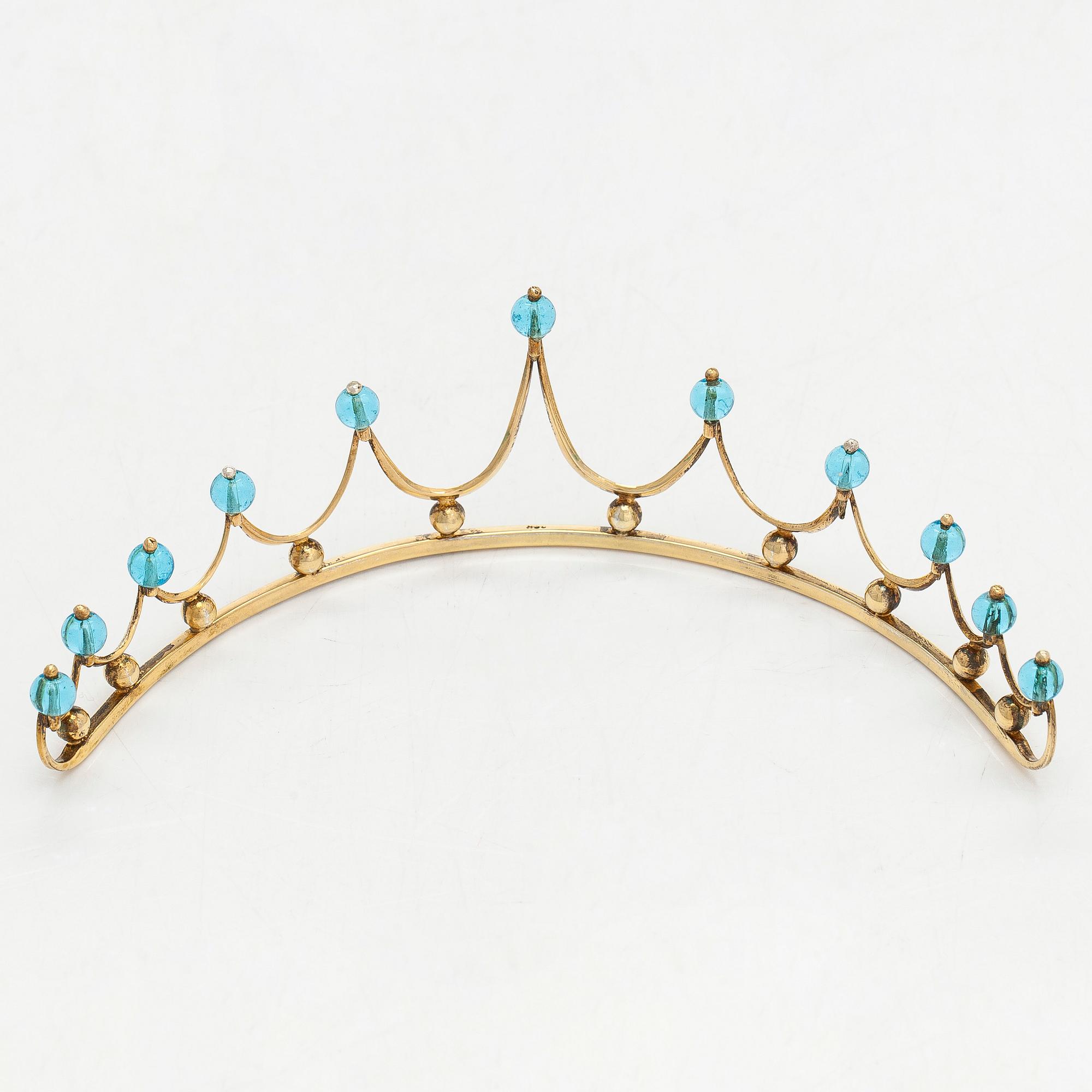 A gilded sterling silver tiara with topazes.