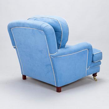 A 21st century 'Howard model' armchair, England.