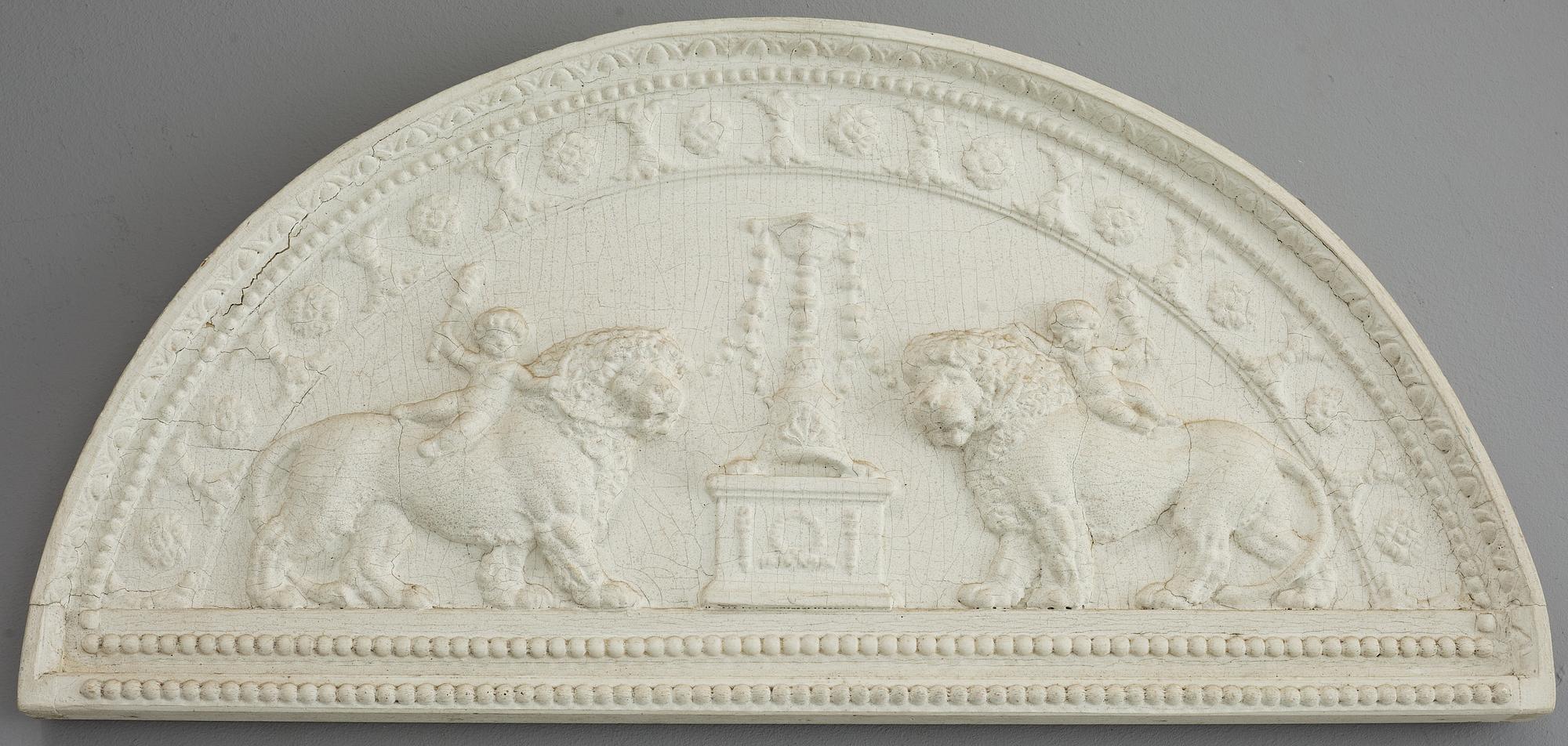 A late Gustavian carved and gesso crest, circa 1800.