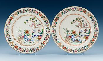 1602. A pair of famille rose chargers, Qing dynasty, Qianlong (1736-95).