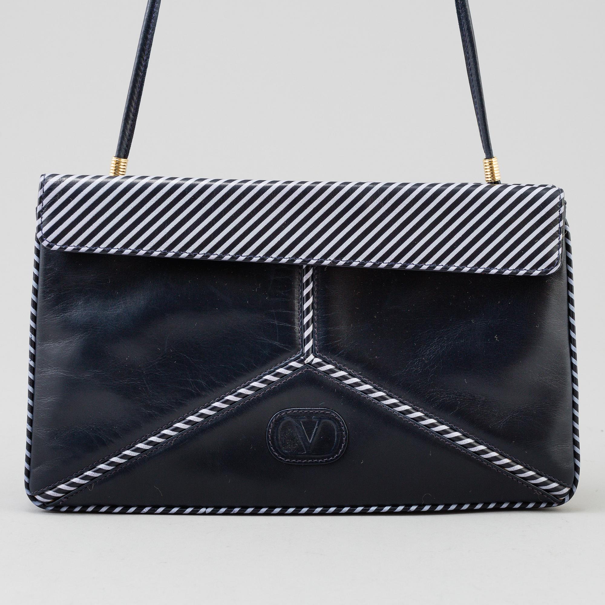 VALENTINO GARAVANI, a leather clutch from Les Sacs, 1980's.