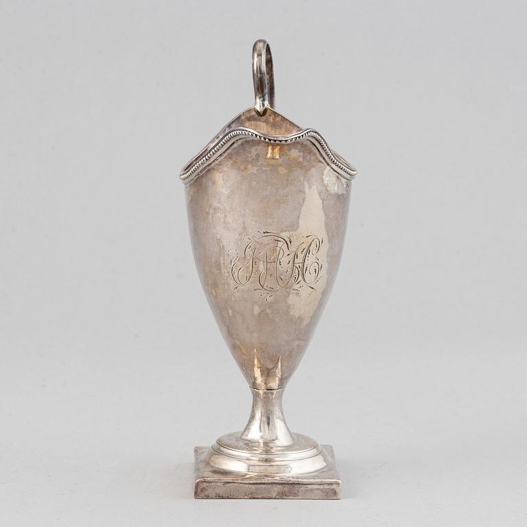 An English 18th century silver cream-jug, mark of John Lambe possibly, London 1786.