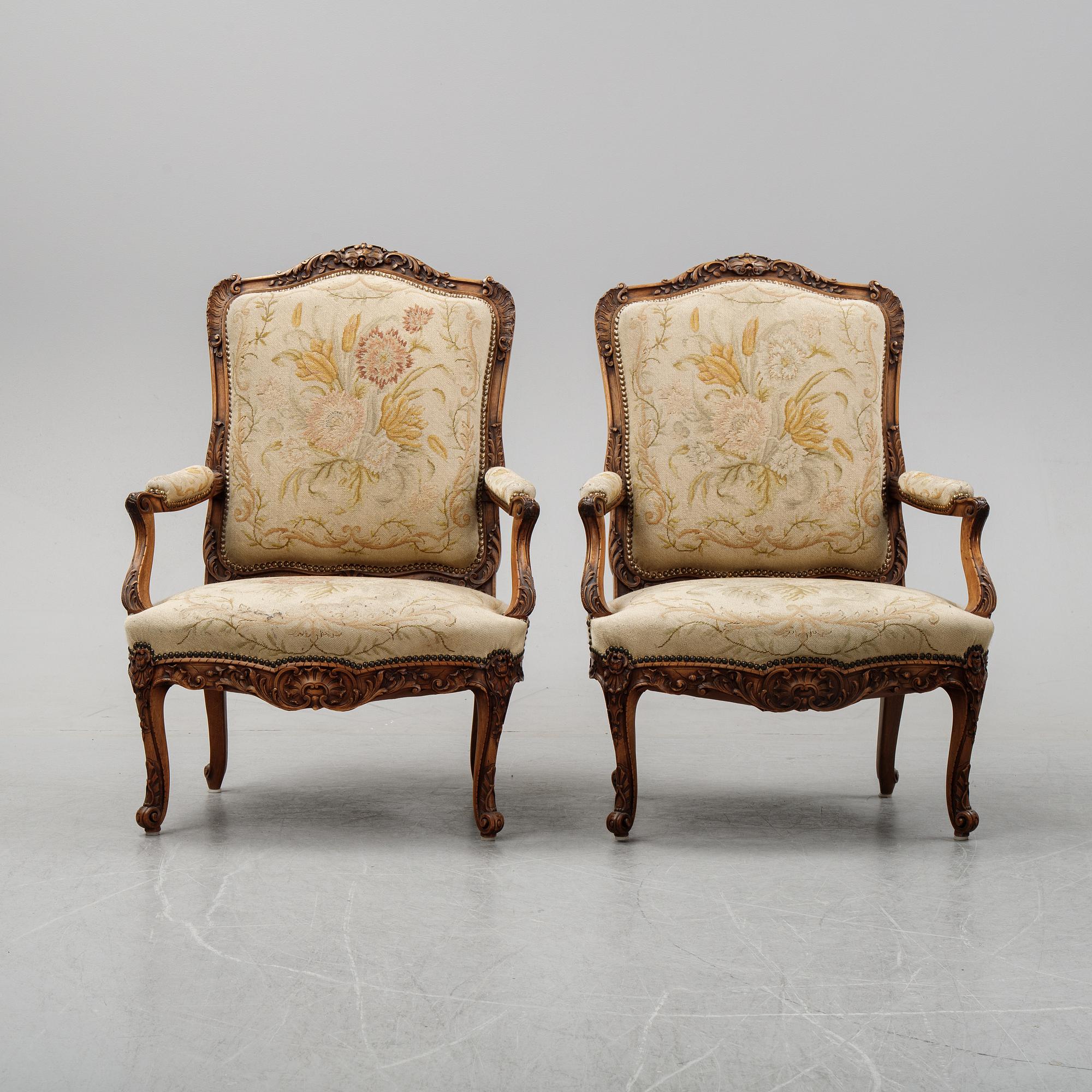 A pair of Louis XV style armchairs from early 20th Century.