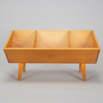 A 1990s book shelf designed by Bruno Mathsson.