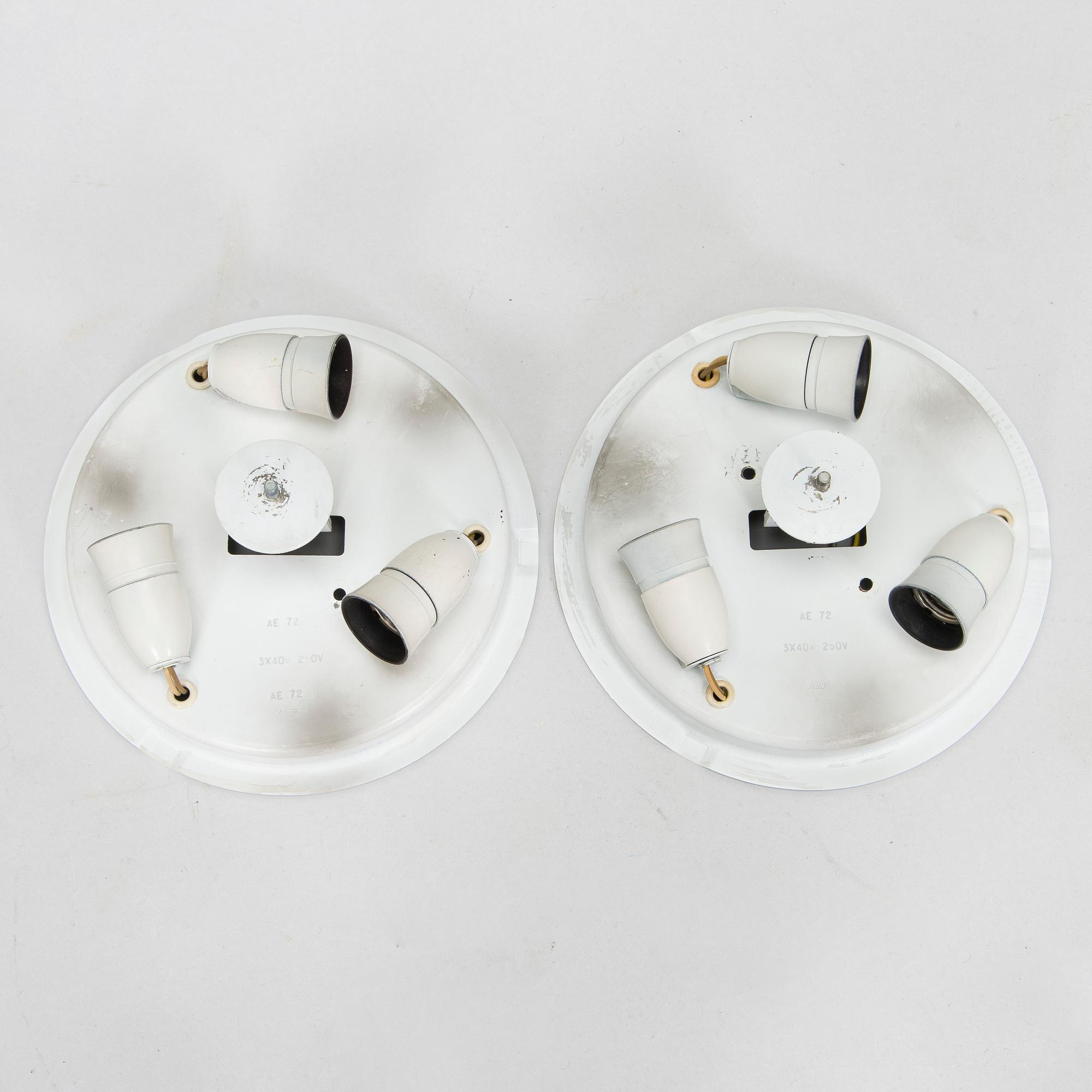 A pair of mid-20th century 'EA 72 ceiling lights for Itsu.