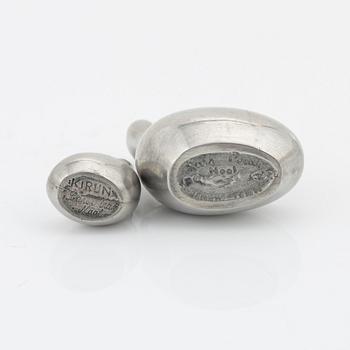 A pair of pewter salt containers by Lars Pirak, signed.