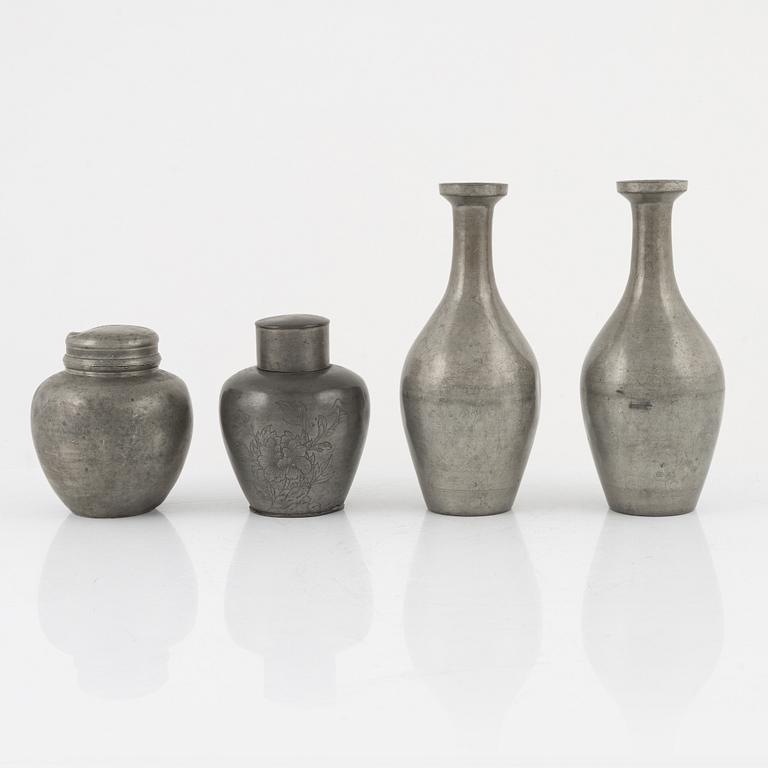 Two Japanese pewter vases and two tea caddies with covers, 20th Century.