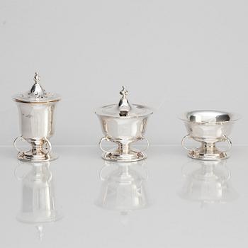 Josiah Williams & Co, an eight piece silver cruet set, London 1904.