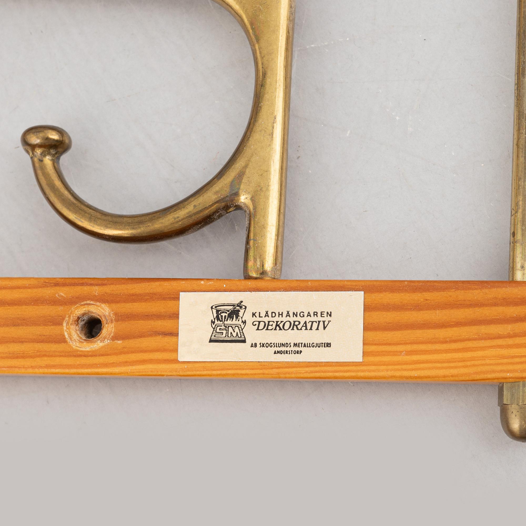 A pair of 'Dekorativ' coat hangers, Skoglunds metallgjuteri, Anderstorp, 1950's/60's.