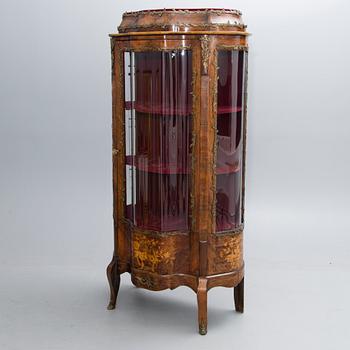 A late 19th French century display cabinet in Rococo style.