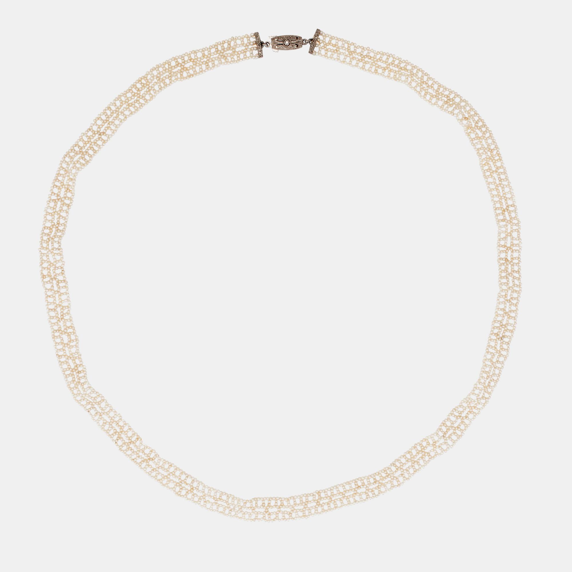 A natural seed pearl lace necklace.