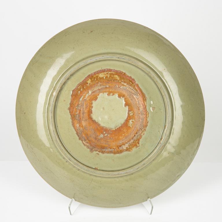 A celadon dish, Ming (1368-1644), for South East Asian market.