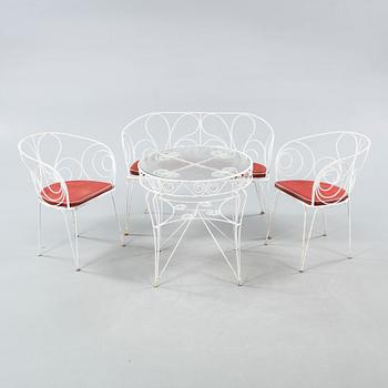 Four 20th century garden furnitures.