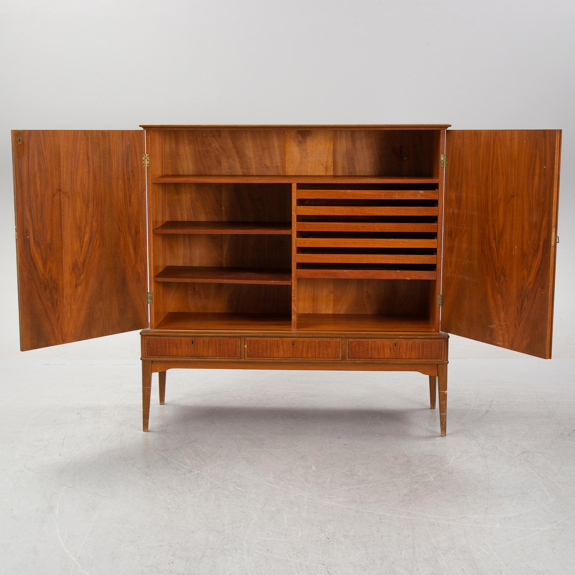 A walnut veneered cabinet, 1940's/50's.