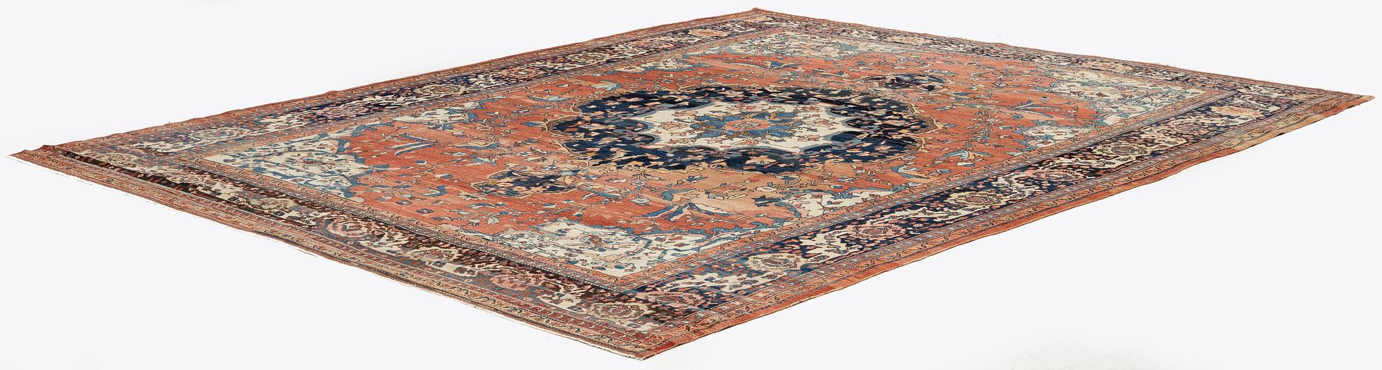 An Antique Sarouk carpet, West Persia, c. 353 x 260 cm.