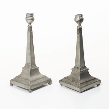 A pair of peuter candlesticks by Petter Höijer, Örebro (1796-1819).
