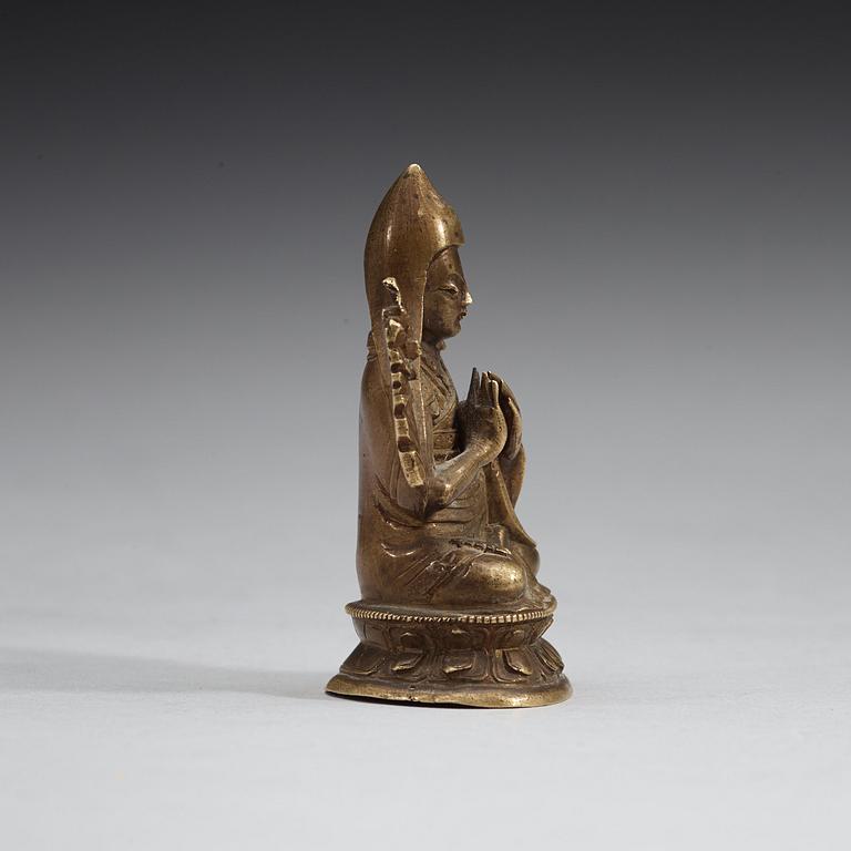 A seated bronze figure of Tsong Khapa, Tibet, 19th Century.