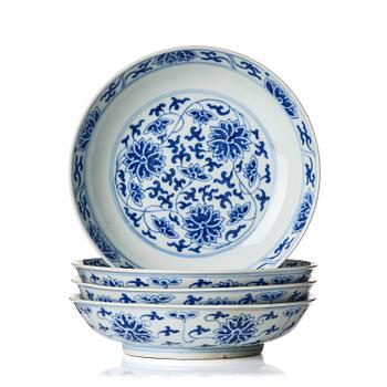 1341. A set of four blue and white 'lotus dishes', Qing dynasty, Tongzhi mark and period (1862-1874).