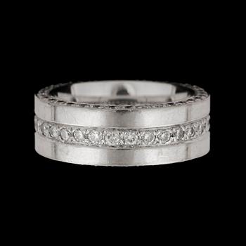 138. A brilliant-cut diamond eternity ring. Total carat weight circa 1.00 ct.