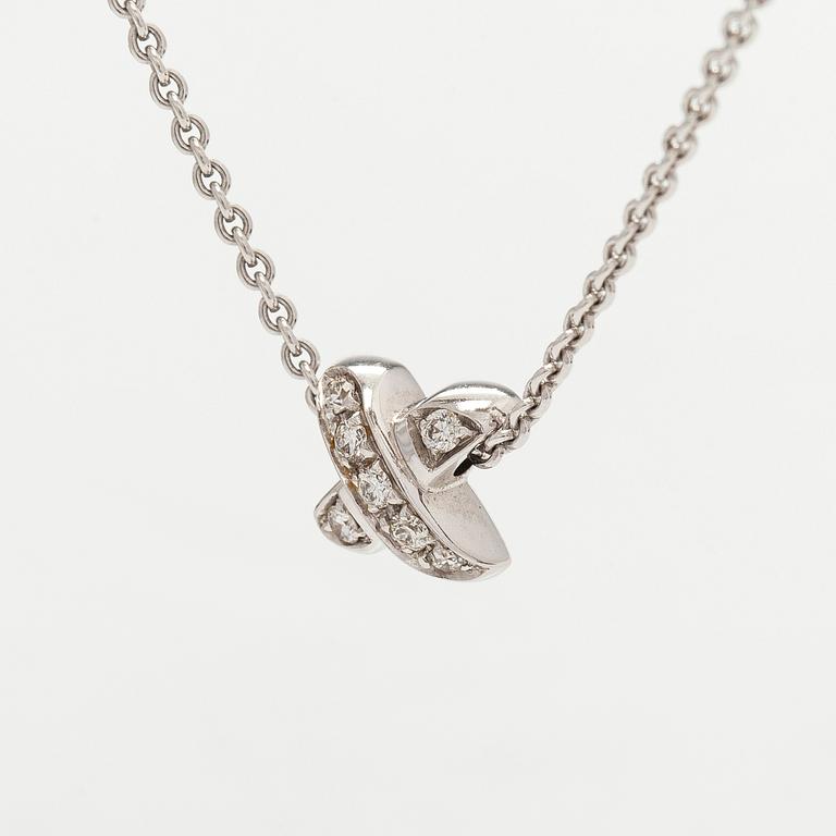 Tiffany & Co, kaulakoru "Cross Stitch", 18K valkokultaa ja timantteja.