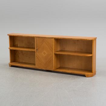 A 1940s elm veneered shelf.