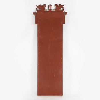 A Empire style mirror, late 19th Century.