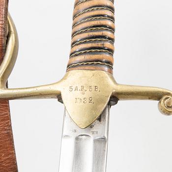 A Swedish sabre 1899 pattern with scabbard with another sword.