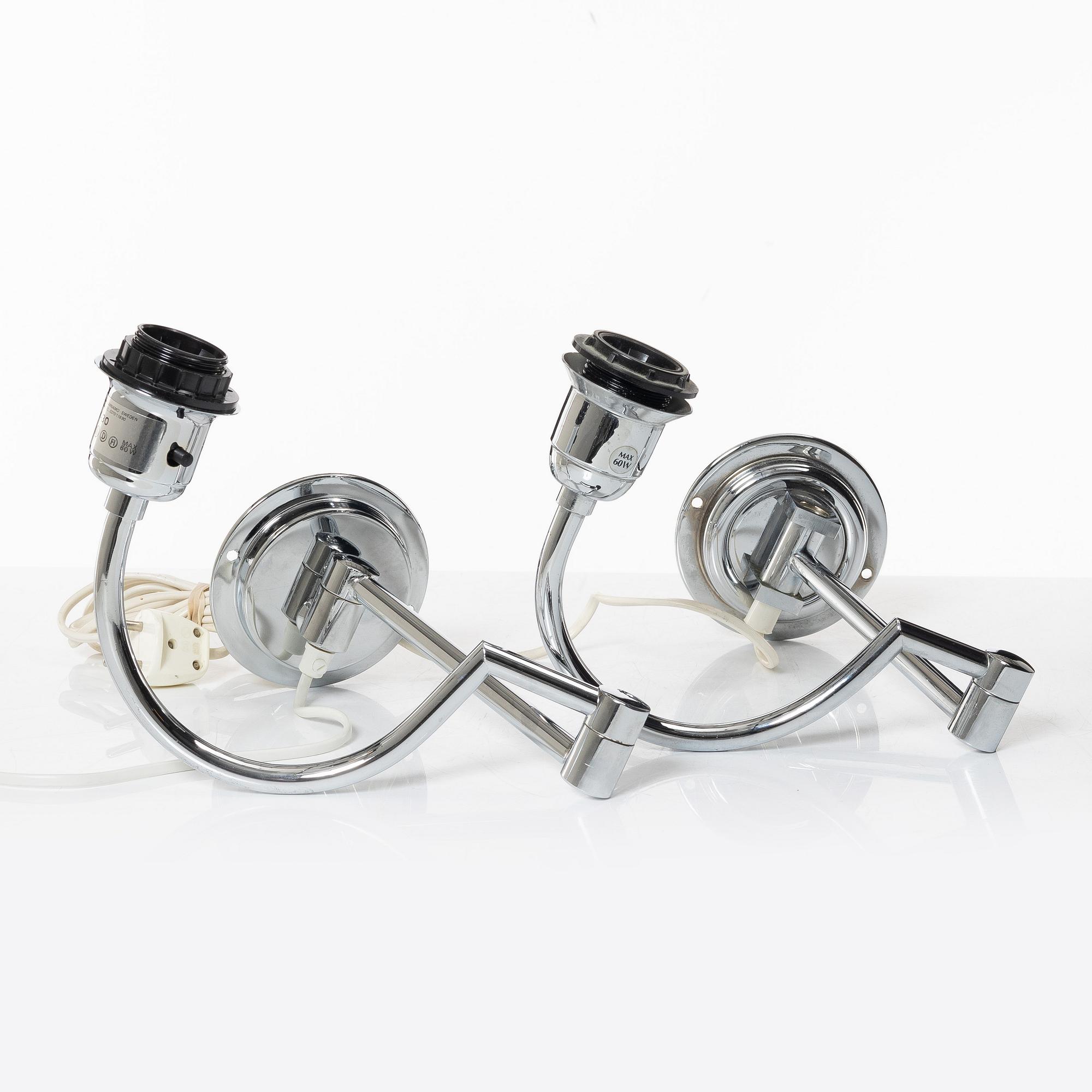 A pair of wall lamps EVÅ end of the 20th century.