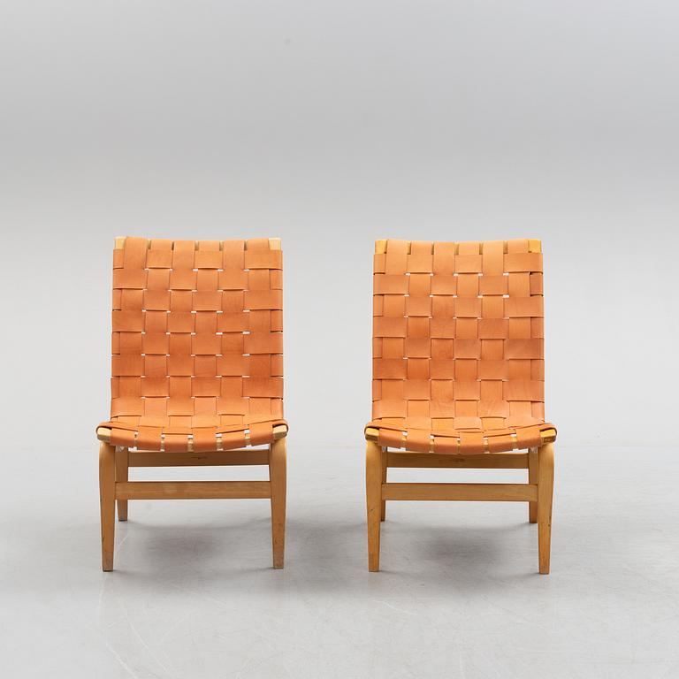 A pair of Bruno Mathsson 'Eva' lounge chairs, by Karl Mathsson, for VÄrnamo, 1965 and 1970.