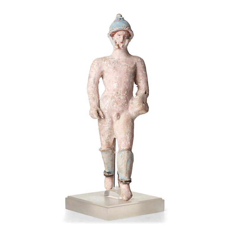 A Greek terracotta sculpture of a warrior, Hellenistic period, Canosa, 3rd Century B.C.