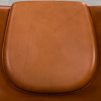 An 'Ägget' easy chair with stool by Arne Jacobsen, Fritz Hansen.