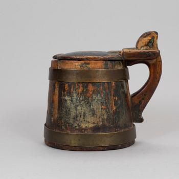 A swedish folk art wood tankard.