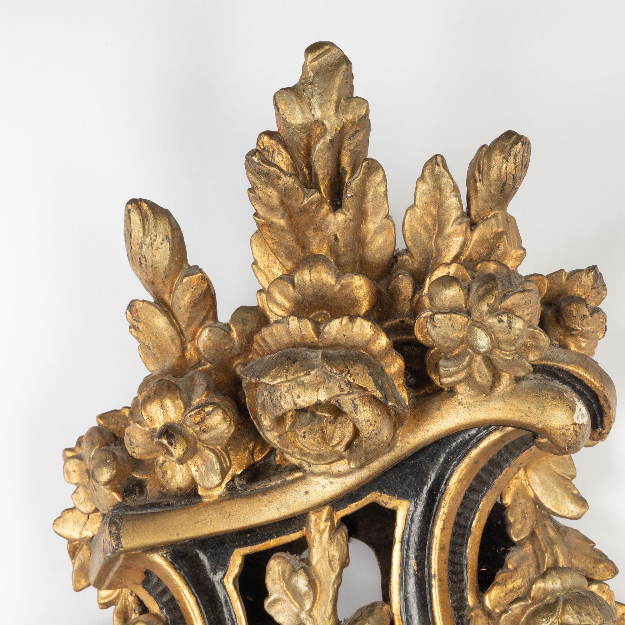 A Rococo wall clock, second half of the 18th Century.