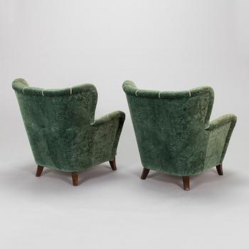 Ilmari Lappalainen, a pair of 1950's 'Laila' armchairs for Asko, Finland.